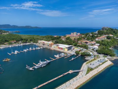 Aerial view of Flamingo Marina in Playa Flamingo Costa Rica with yachts and luxury condos