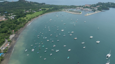 Playa Potrero Costa Rica Real Estate near the bay with sailboats, yachts, and calm turquoise waters.