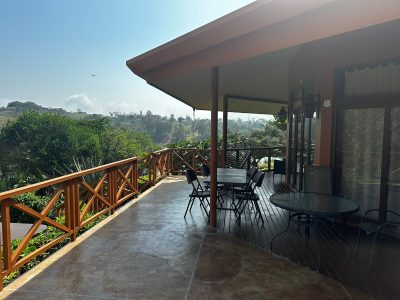 Covered terrace at Buena Vista #6 with seating and Lake Arenal views near Nuevo Arenal