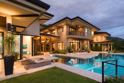 Luxury ocean-view home Casa Symbiotica with infinity pool at sunset in Mar Vista, Playa Flamingo