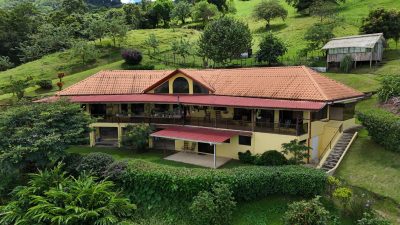 Stunning 8.15 Acre Lake Arenal Estate with panoramic countryside views, wide terraces, and lush landscaped grounds in Tronadora.