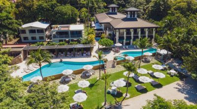 Seas the Day ocean view condo for sale in Pacifico Resort Playas del Coco Costa Rica with resort-style pools and gardens