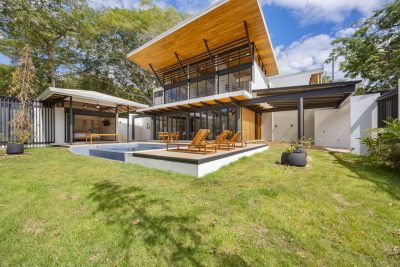 Casa Garza del Sol modern two-story villa in Tamarindo with pool, lawn, and tropical design | Costa Rica Real Estate CR