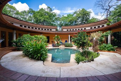 Casa Tortuga courtyard with heated saltwater pool and tropical gardens in Catalina Cove, Playa Brasilito long term rent