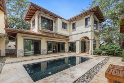 Spanish colonial style two-story home with pool and terraces in Hacienda Pinilla, Costa Rica real estate