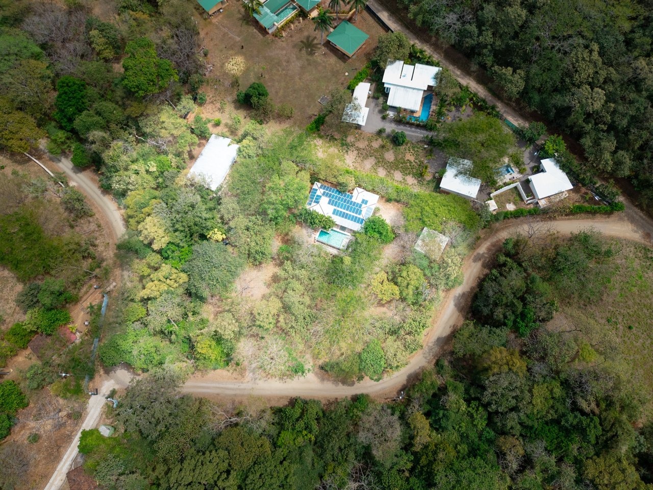 Aerial view of V-Iguana Finca Panamá, multi home property in Guanacaste Costa Rica with pool and acreage