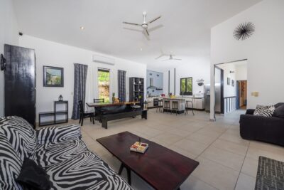 Villa Eva Tamarindo open living area with kitchen and dining space, mountain view home Tamarindo Costa Rica
