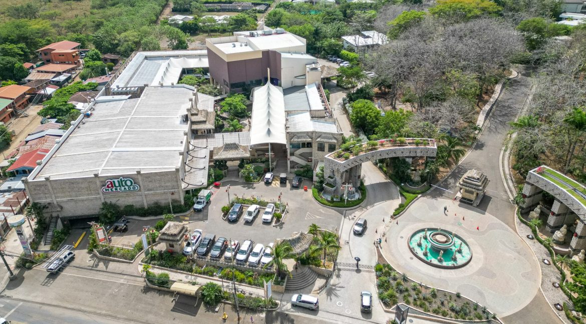 Aerial view of Senderos Tamarindo community showing luxury homes, private pools, and greenery | Costa Rica Real Estate Cr
