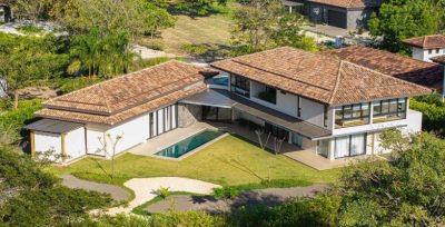 Casa Rocamar luxury beachfront villa in Hacienda Pinilla Costa Rica with pool and tropical landscaping