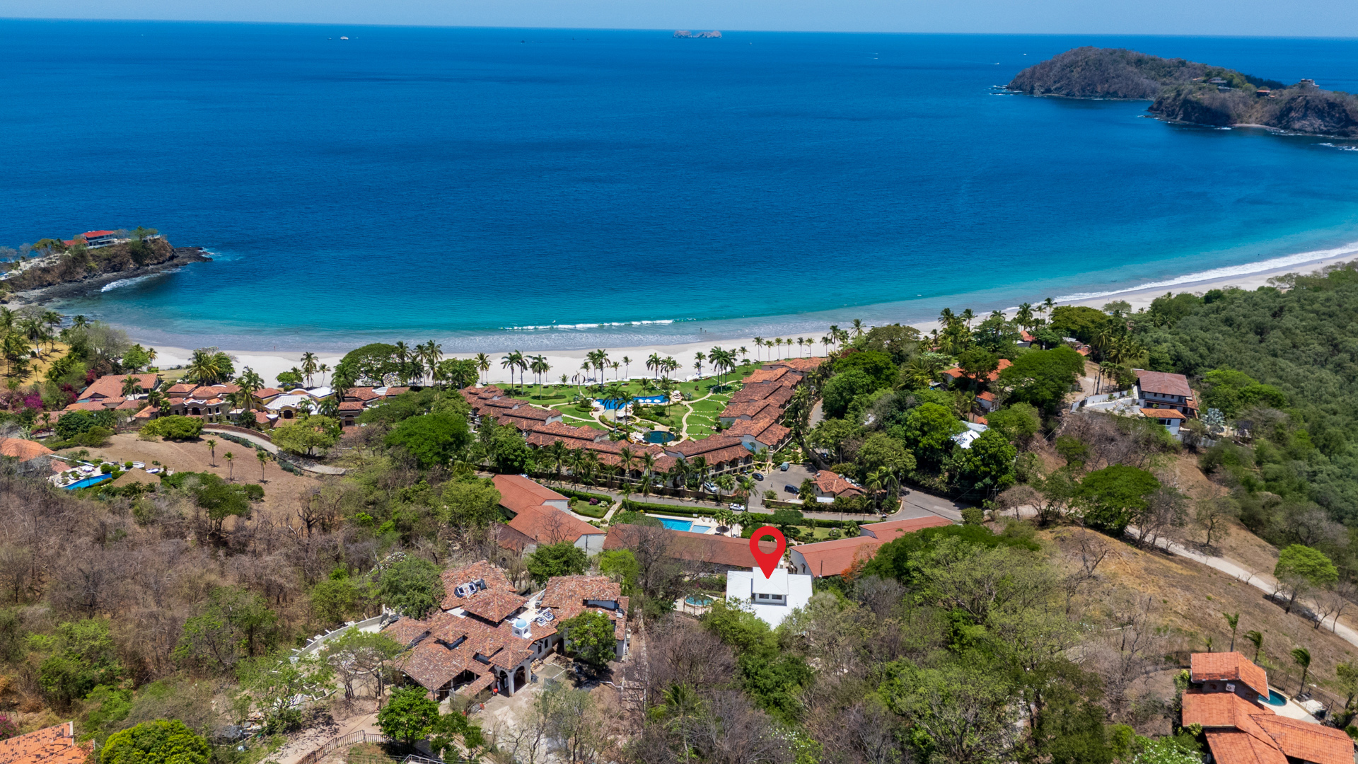 Aerial view of Casa Veranera overlooking Playa Flamingo coastline – Costa Rica Real Estate Cr