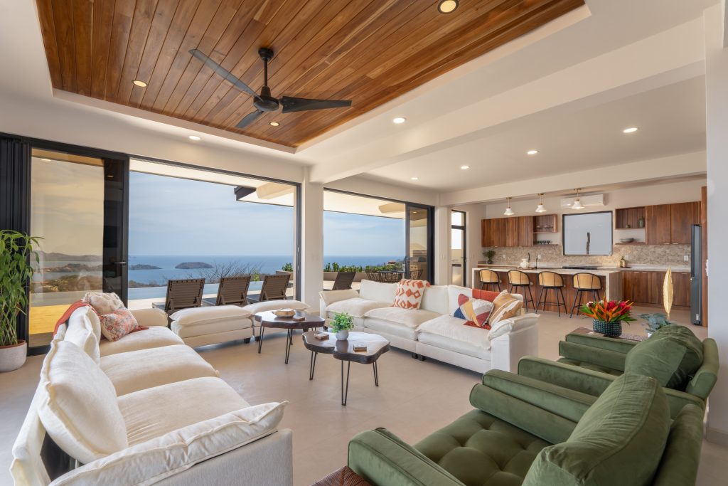 Open living room with ocean views at Casa Vista Escondida in Pacific Heights overlooking Playa Potrero.