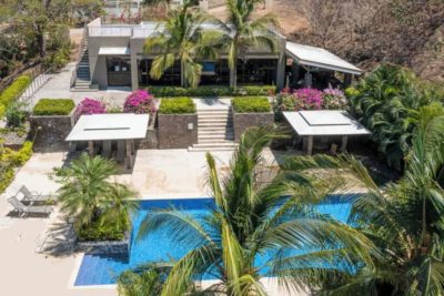 La Perla Tamarindo 143 condo overlooking pool and tropical gardens in Tamarindo, Costa Rica — Tamarindo condo for sale