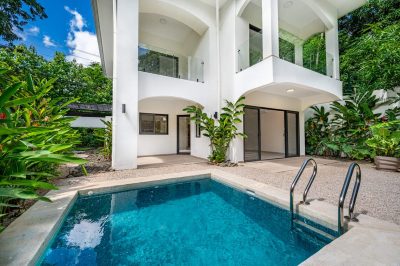 Villa Garden Oasis Surfside Potrero plunge pool and modern exterior in lush tropical setting, ideal Potrero investment property