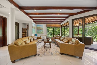 Villa Carao 12 Reserva Conchal living room with garden views in Costa Rica golf course home
