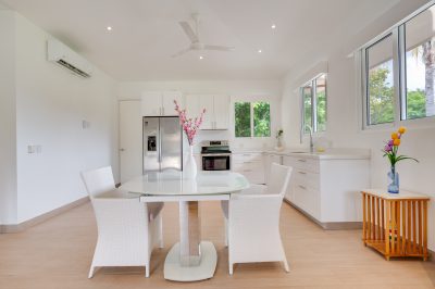 Colibri and Lorito bright kitchen with dining area Rancho Cartagena Guanacaste Costa Rica