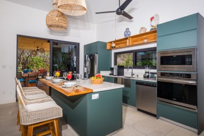 Outdoor BBQ ranch and dining space at Casa Julia in Los Almendros, Hacienda Pinilla | Costa Rica real estate CR