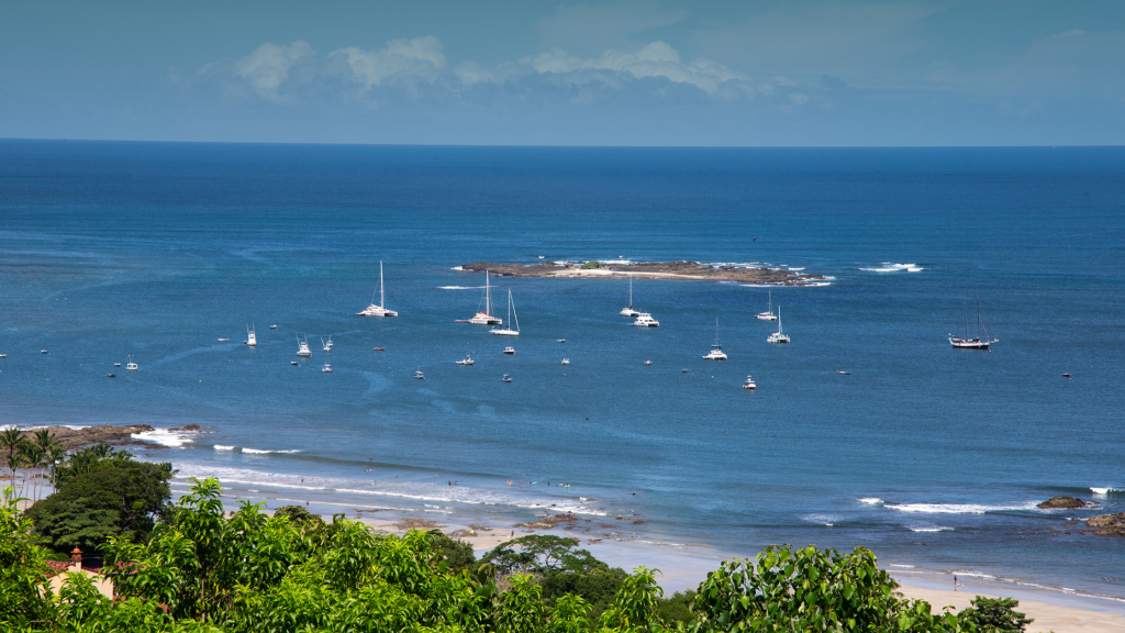 Aerial view of Tamarindo Beach, Costa Rica with homes and condos for sale in the Tamarindo Real Estate market.