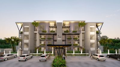 Modern condo building at Flamingo Marina Tower 101 with landscaped entry, balconies, and parking in Playa Flamingo, Costa Rica.