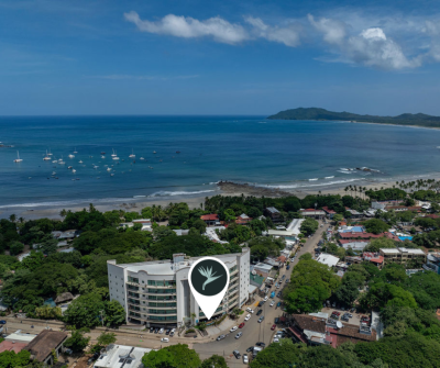 Aerial view of Tamarindo beach town near Cha Cafe Tamarindo, a cafe business for sale in Tamarindo Costa Rica.