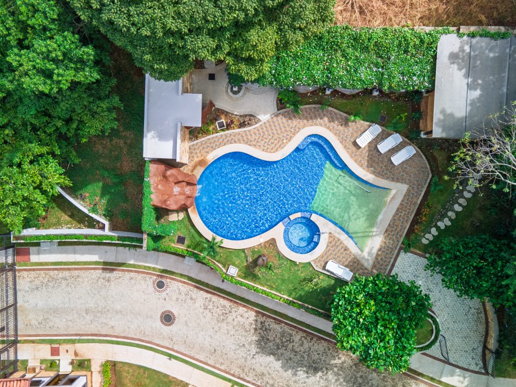 Aerial pool view at Monte Hermoso 9, a Costa Rica beach home investment with resort-style amenities