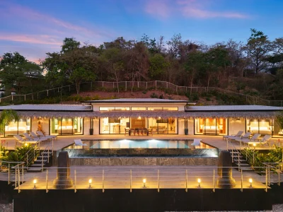Luxury ocean view villa with infinity pool overlooking Tamarindo, Costa Rica at sunset