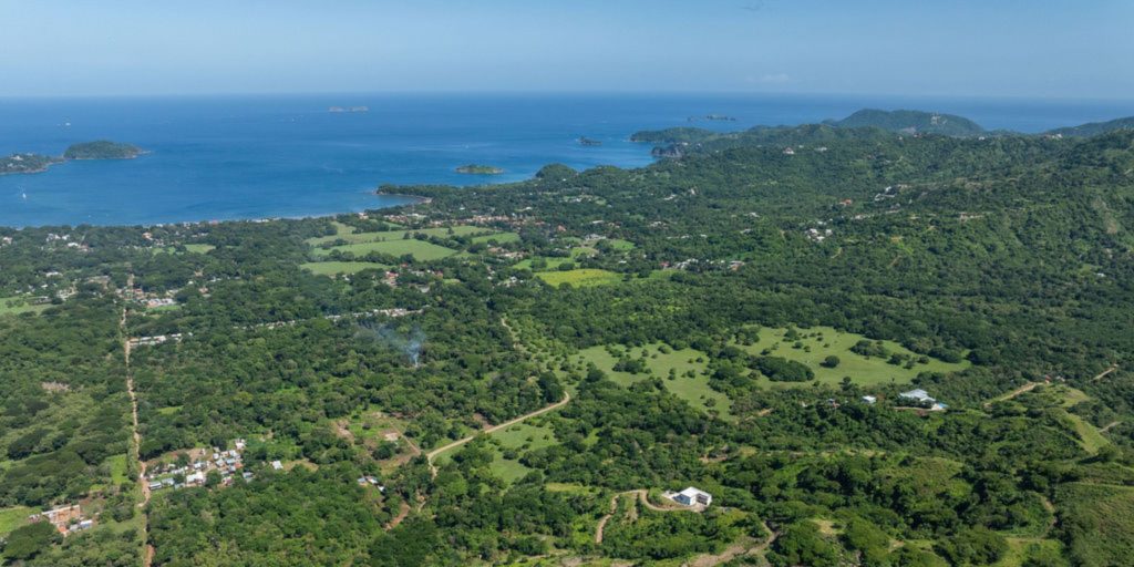 Aerial view of the forested hillside site for Potrero Hills, a new residential development in Potrero Costa Rica