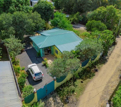 Casa Amarilla single-level home with pool and large fenced lot in Playas del Coco Costa Rica