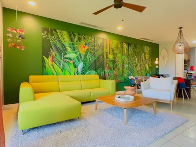 Living area in Pacífico L514 with colorful accent wall, modern furnishings, and open-concept layout