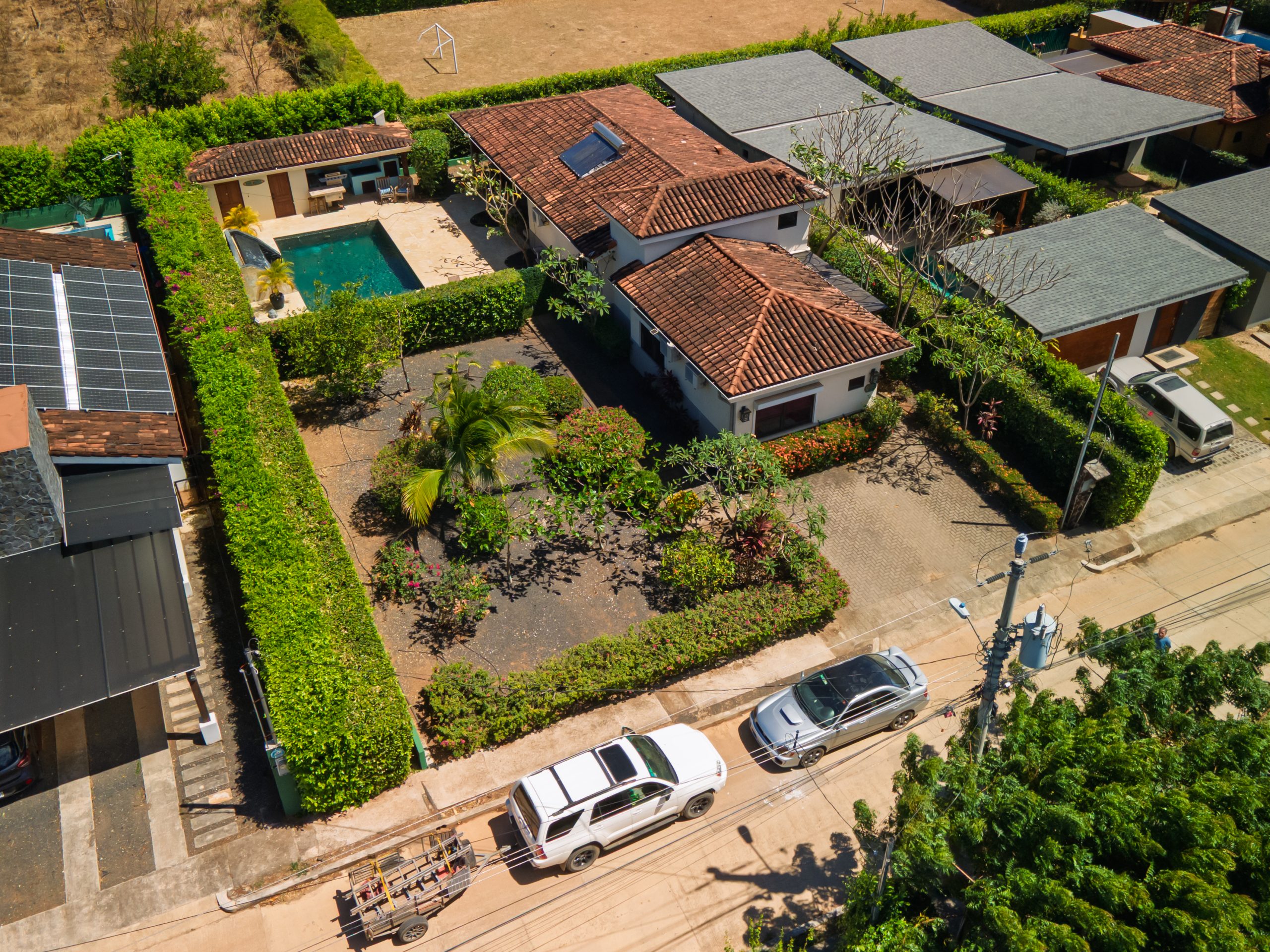 Aerial view of Casa Jala with private pool and double-lot setting in Loma Verde