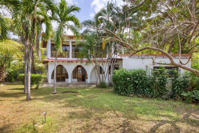 Vista Marina Beach House Potrero exterior with tropical garden and arches, Playa Potrero beachfront property