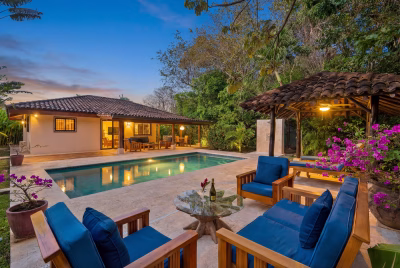 Casa Cacao Playa Potrero with private pool, outdoor lounge seating, and tropical garden setting in Guanacaste, Costa Rica.