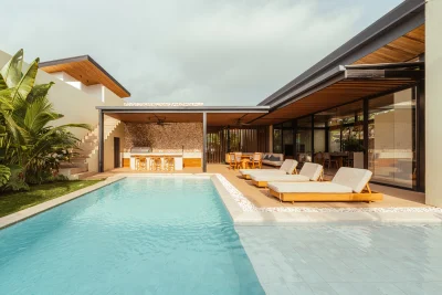 Casa Delirio Playa Grande pool and outdoor lounge area, a Playa Grande beach home with covered terrace and seating