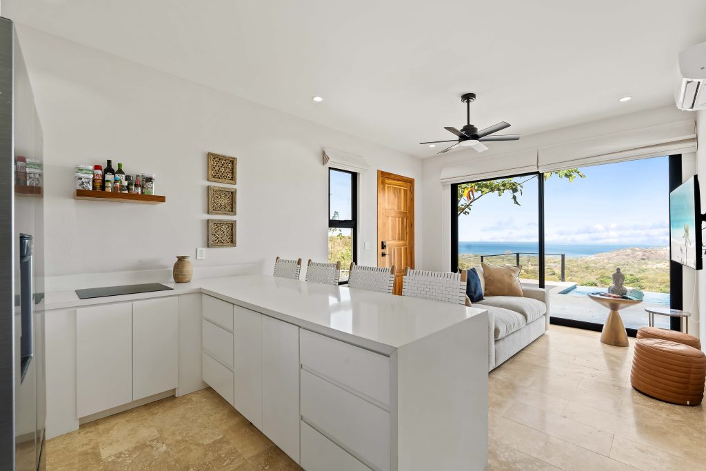 open kitchen and living area in build-ready home Mar Vista Costa Rica with ocean view