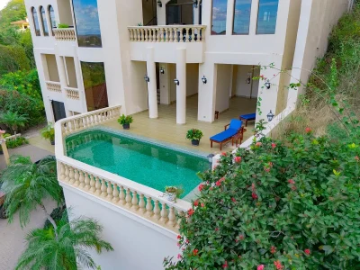 Bella Vista B2 U2 terrace and pool area overlooking hillside landscape in Playa Hermosa, Costa Rica