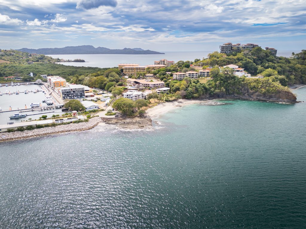 Aerial view of Playa Flamingo hillside and marina coastline in Guanacaste near Casita Dorado