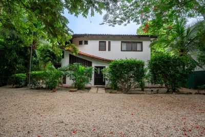 The Surf House Playa Grande exterior with tropical garden and private setting, a Playa Grande beach home in Costa Rica
