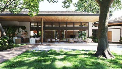 Villa Indra in Hacienda Pinilla showing open terrace, garden lawn, and outdoor living pavilion — Hacienda Pinilla luxury estate