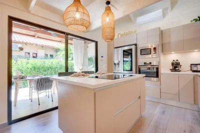 Villagio Claudia Potrero Home kitchen with island and modern appliances, modern home Potrero Guanacaste