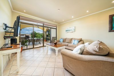 Sunrise 3 Tamarindo living room with terrace access and seating area, condo near Tamarindo beach Costa Rica
