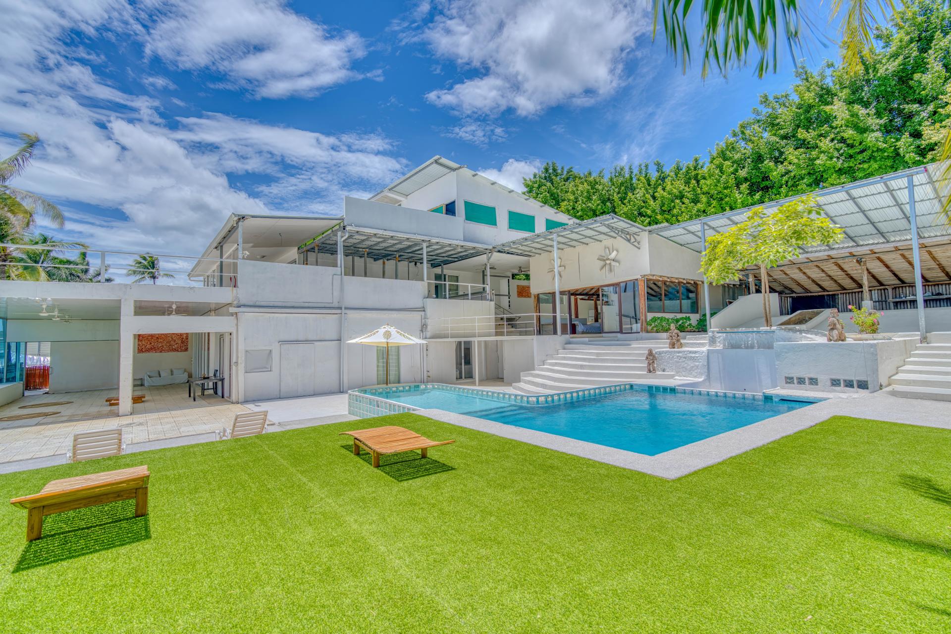 La Mansion pool terrace and modern exterior, Surfside Flamingo beachfront property for sale in Guanacaste