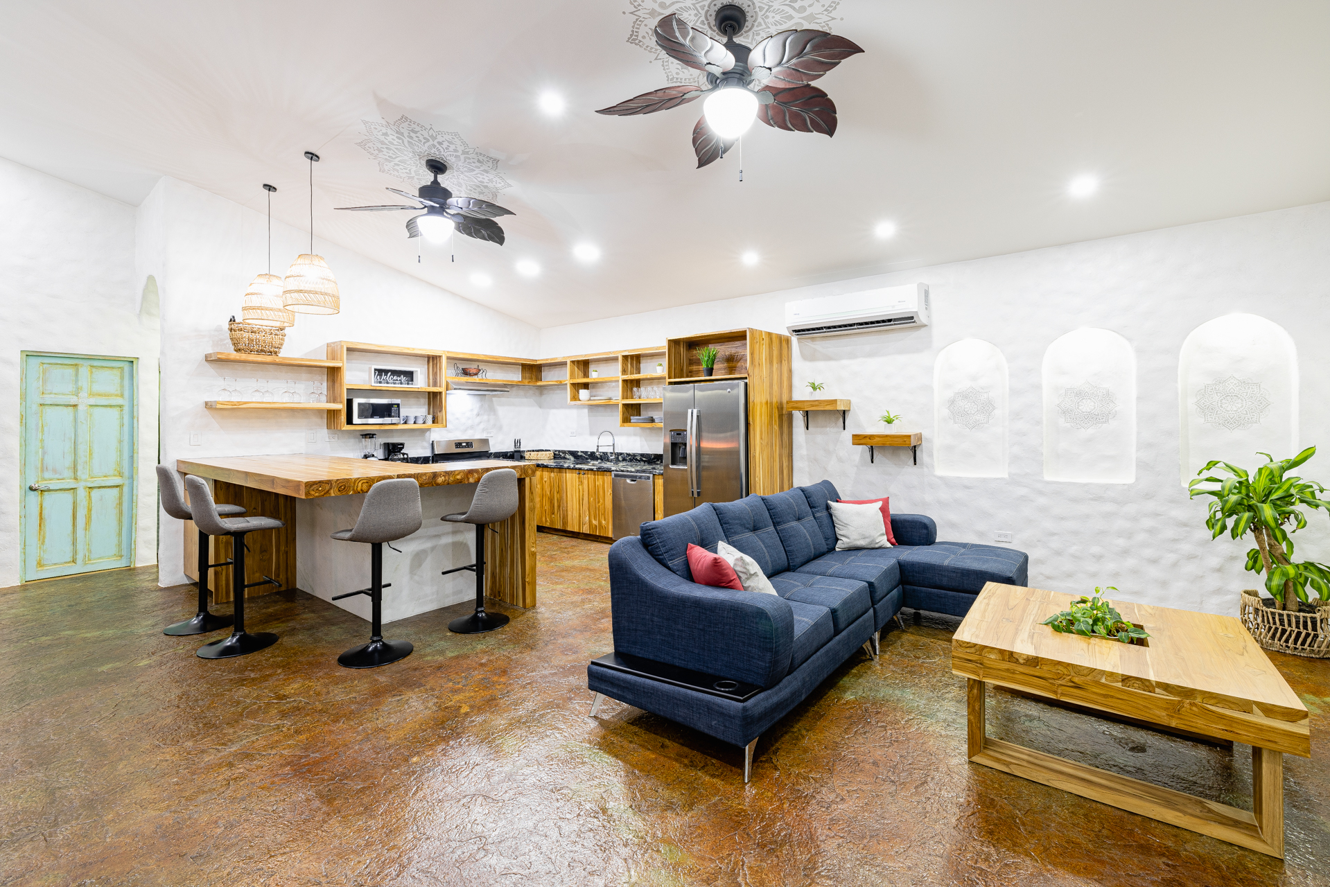 Casa Estrella luxury retreat in Surfside Potrero with open-concept kitchen, breakfast bar, and modern living area