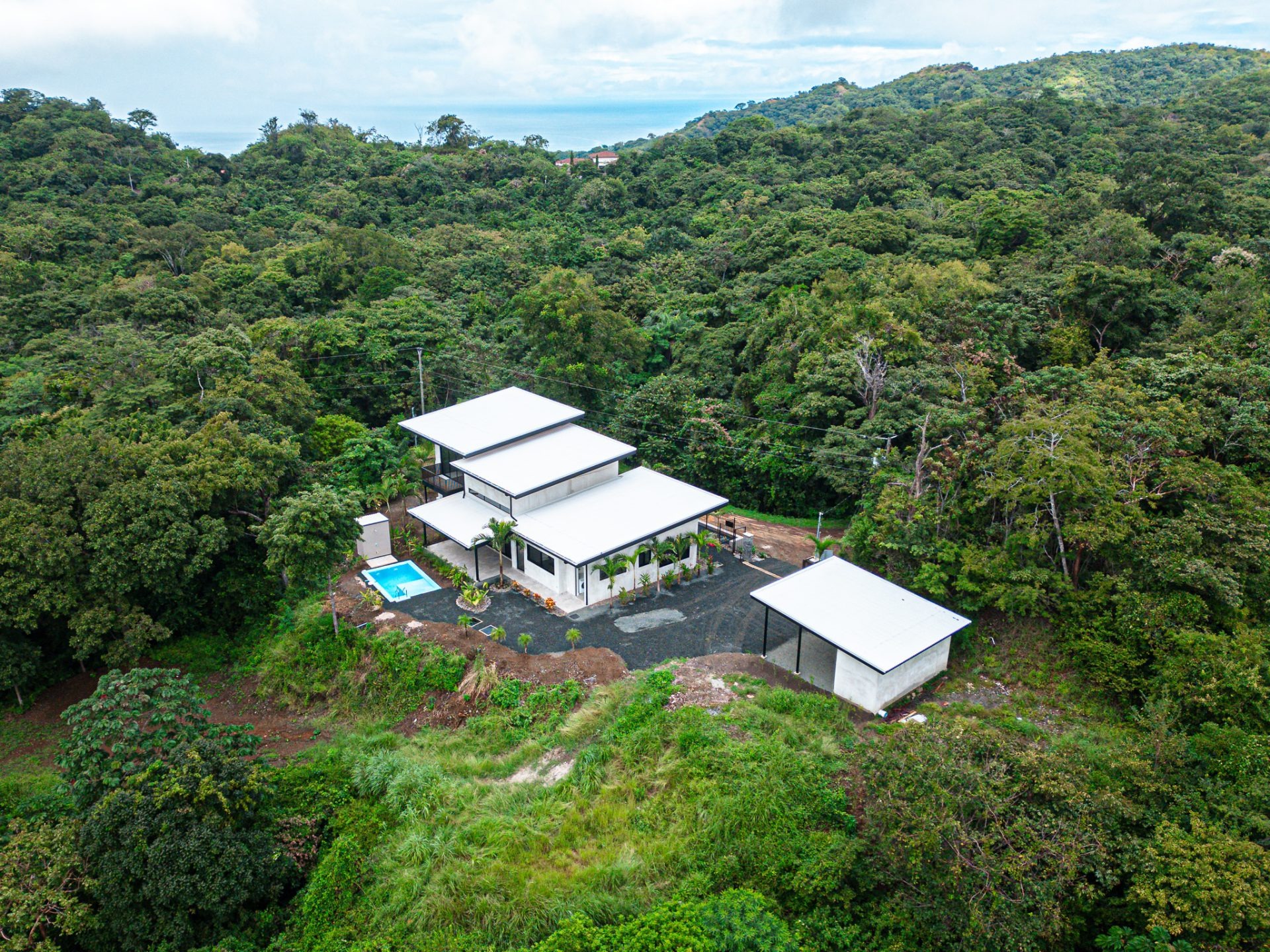 Aerial view of Casa La Paz on 6-acre lot in Sardinal, modern home with acreage in Costa Rica