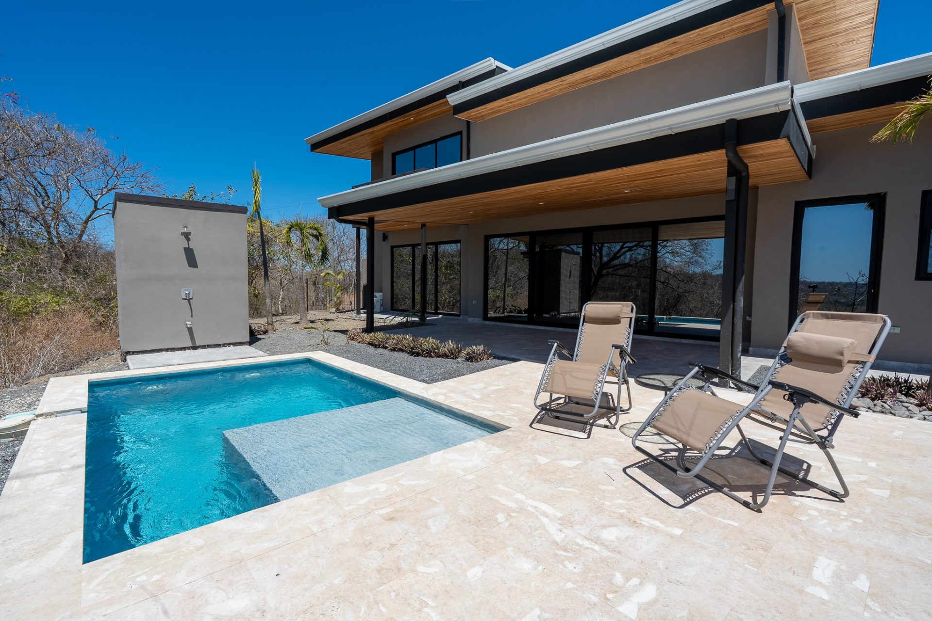 Casa La Paz pool terrace with modern exterior in Sardinal, eco-friendly home in Guanacaste Costa Rica