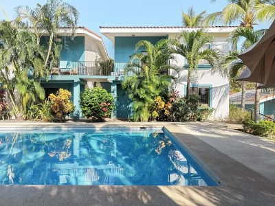 Colibrí 7 Playas del Coco condo with pool and tropical landscaping in Las Palmas, Costa Rica beach condo