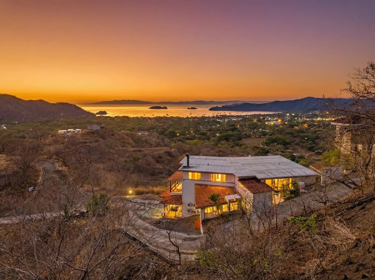 Lookout Suites hillside property at sunset overlooking Gulf of Papagayo in Playas del Coco Costa Rica