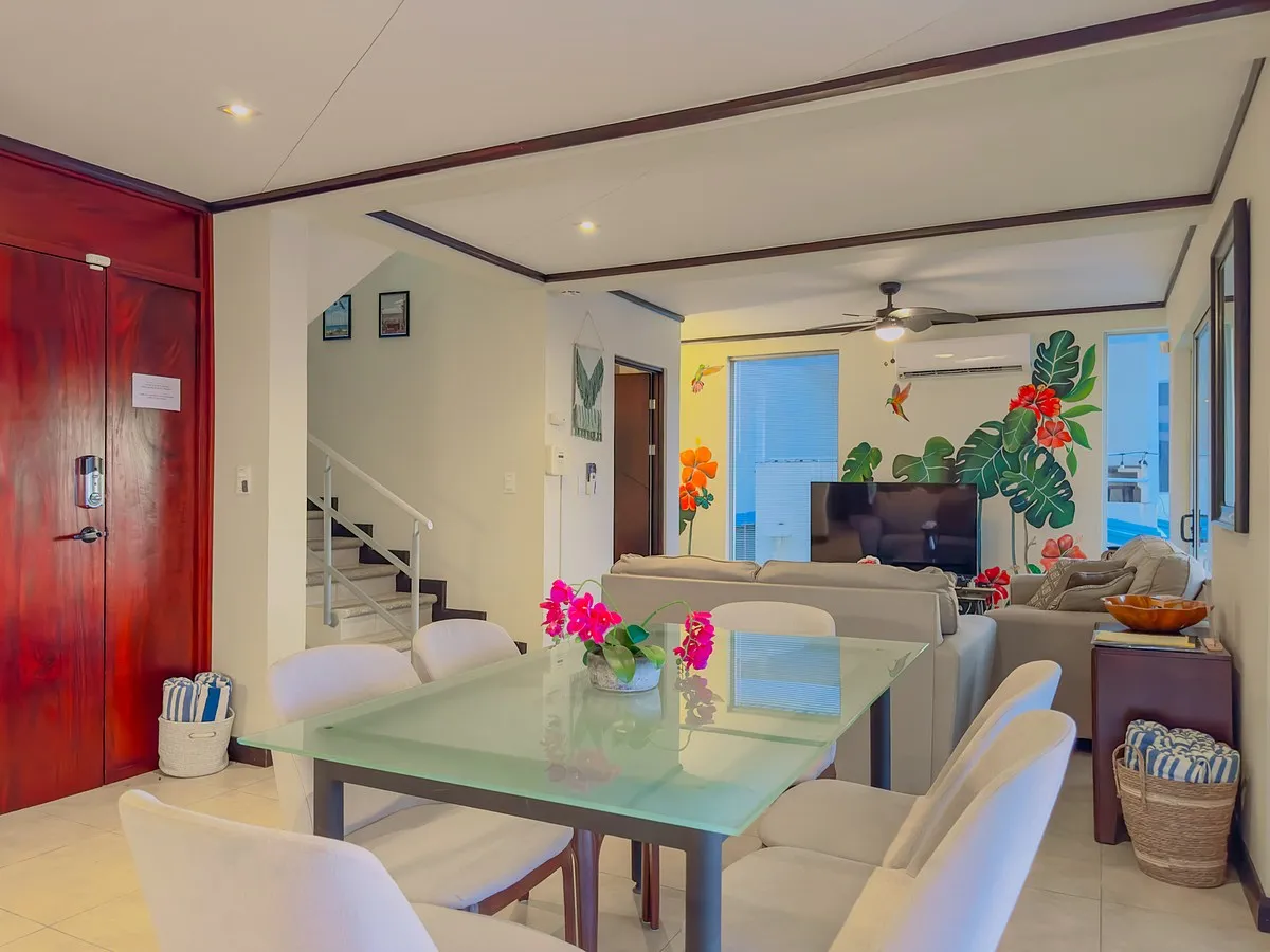 Pacific View House dining and living area in Playas del Coco with open layout and bright coastal interiors