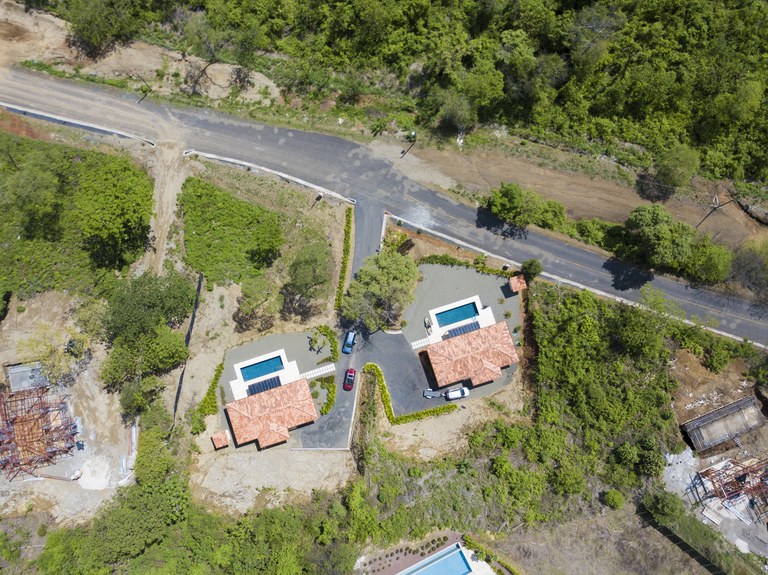 aerial view of dual-home property in Mar Vista Playa Flamingo Costa Rica with pools, suitable for rental income and flexible living