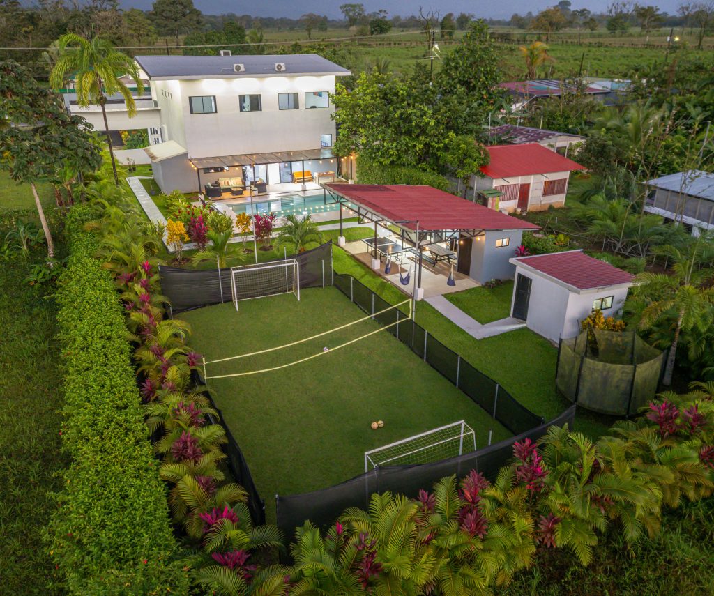 Villa Montreal aerial view with pool, rancho, and yard, an income-producing property near Arenal Volcano