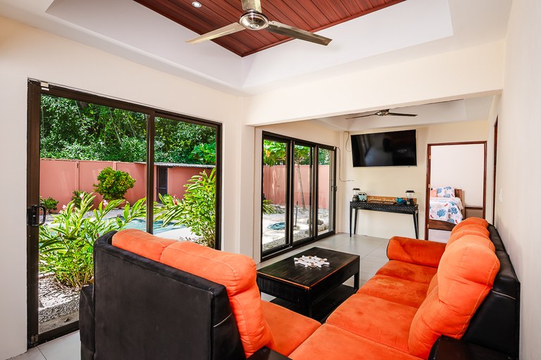 Casa Bell Nido living room opening to the pool at a 6 bedroom home with private pool in Playa Potrero