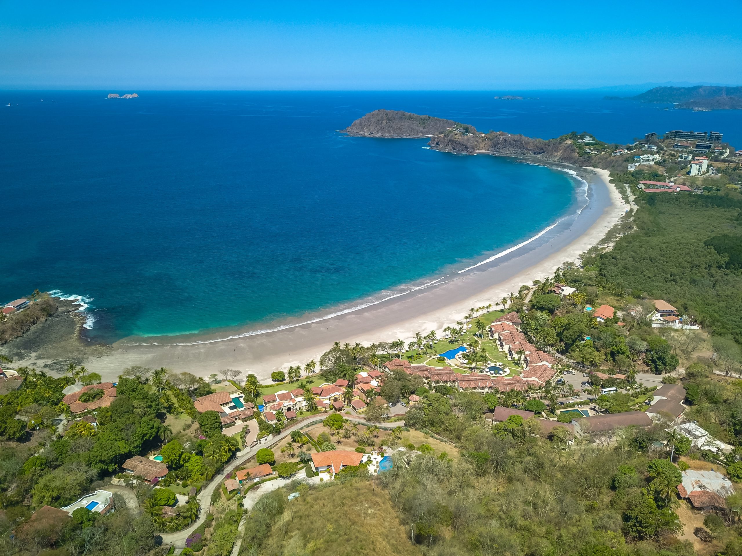 Aerial view of luxury beach villas demonstrating premium Playa Flamingo rental yield potential in Guanacaste.